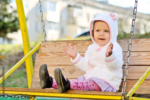 Photo: toddler girl on swing toddler girl on swing