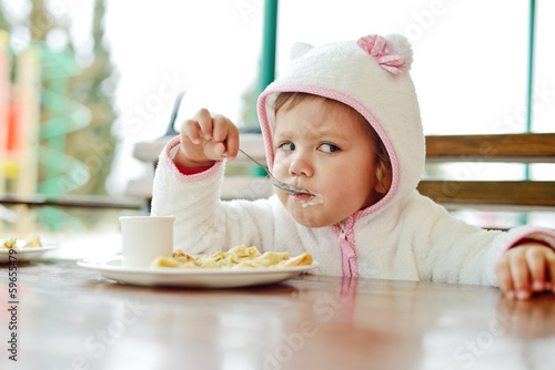 Photo: toddler in cafe toddler in cafe