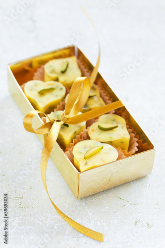 Photo: Homemade white chocolate candy heart in gift box Homemade white chocolate candy heart in gift box