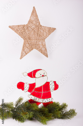 Photo: Weihnachtsmann mit Weihnachsstern Weihnachtsmann mit Weihnachsstern