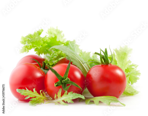 Photo: Tomatoes end Lettuce isolated on white background Tomatoes end Lettuce isolated on white background