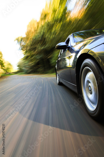 Photo: Car speeding. Car speeding.