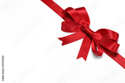 Photo: Red ribbon with bow on white Red ribbon with bow on white