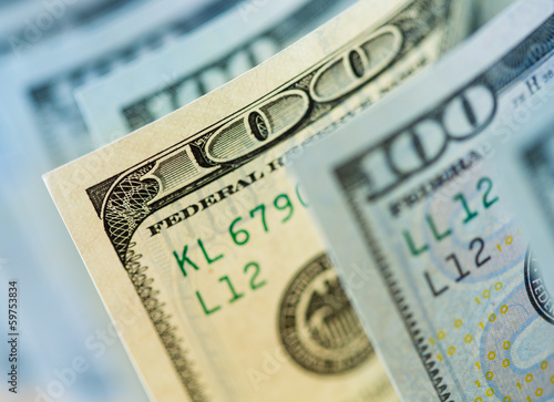 Photo: One old type hundred dollar banknote among new ones One old type hundred dollar banknote among new ones