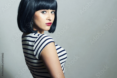 Photo: Beautiful Brunette Girl in Dress. Black Hair. bob Haircut.Fringe Beautiful Brunette Girl in Dress. Black Hair. bob Haircut.Fringe