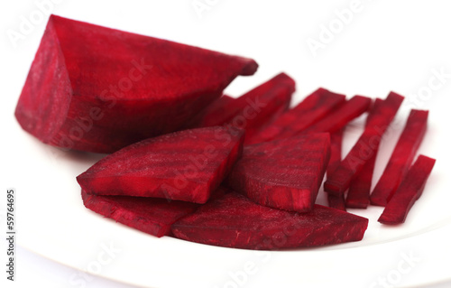 Photo: Sliced red beet on plate Sliced red beet on plate