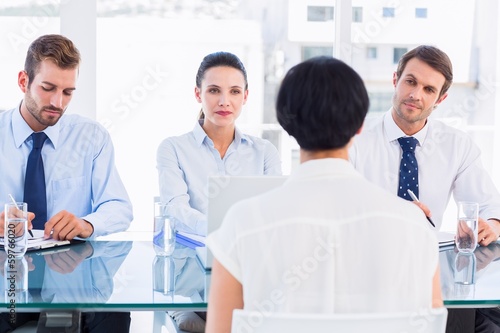 Photo: Recruiters checking the candidate during job interview Recruiters checking the candidate during job interview