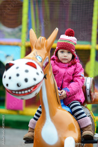 Photo: toddler in theme park toddler in theme park