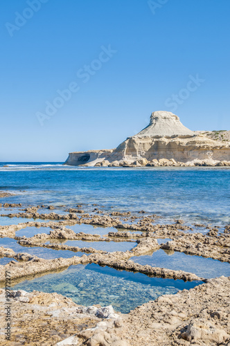 Photo: Salt pans near Qbajjar in Gozo, Malta. Salt pans near Qbajjar in Gozo, Malta.