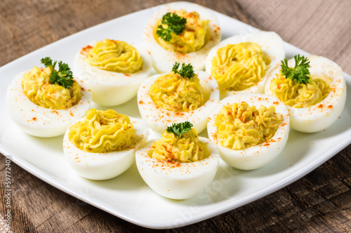 Photo: Deviled eggs garnished with parsley and paprika Deviled eggs garnished with parsley and paprika