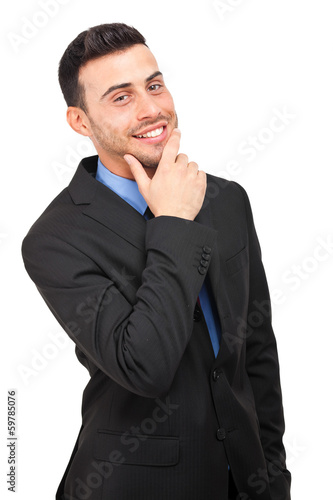 Photo: Smiling businessman isolated on white Smiling businessman isolated on white