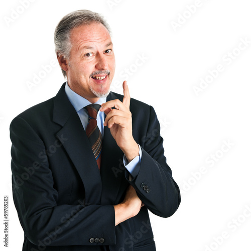 Photo: Businessman pointing his finger up Businessman pointing his finger up