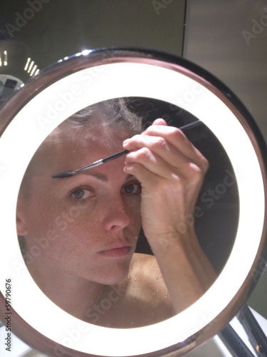 Instant Collection: woman applying make up woman applying make up