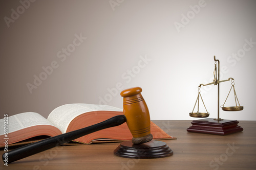 Photo: Golden scales of justice, gavel and books Golden scales of justice, gavel and books