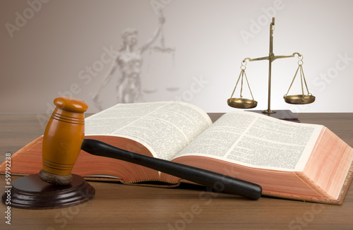 Photo: Golden scales of justice, gavel and books Golden scales of justice, gavel and books