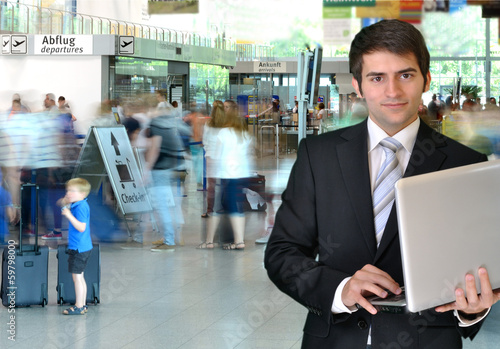 Photo: Geschäftsmann am Flughafen Geschäftsmann am Flughafen
