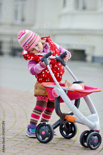 Photo: girl with stroller girl with stroller