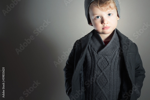 Photo: Little Boy.Handsome Kid. Fashion Children. Winter Style Little Boy.Handsome Kid. Fashion Children. Winter Style