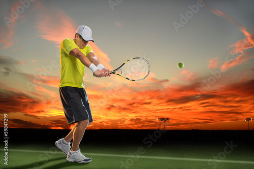 Photo: Tennis Player at Sunset Tennis Player at Sunset