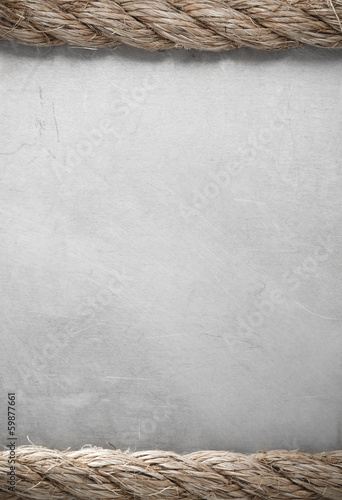 Photo: ship ropes on metal background ship ropes on metal background