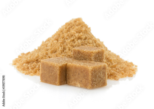 Photo: brown sugar cubes on white brown sugar cubes on white