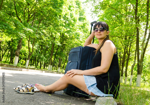 Photo: Woman going on summer vacation Woman going on summer vacation