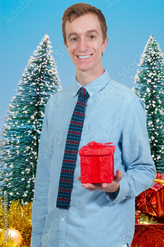Photo: Man Holding Gift Man Holding Gift