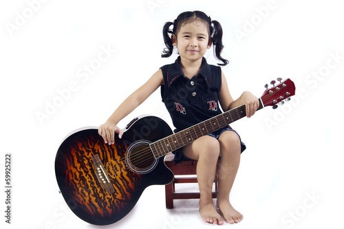 Photo: happy girl with the acoustic guitar happy girl with the acoustic guitar