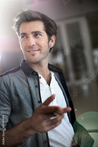 Photo: Portrait of handsome trendy guy Portrait of handsome trendy guy