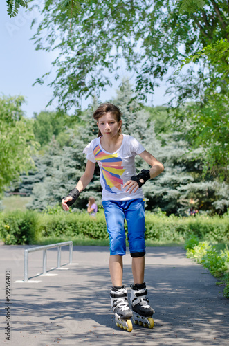 Photo: Young girl at the skate park Young girl at the skate park