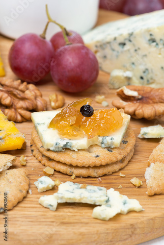 Photo: crackers with blue cheese and apple jam, nuts and grapes crackers with blue cheese and apple jam, nuts and grapes