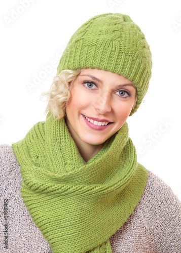 Photo: Portrait of a beauty woman wearing warm sweater Portrait of a beauty woman wearing warm sweater