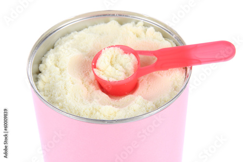 Photo: Powdered milk for baby isolated on white. Powdered milk for baby isolated on white.
