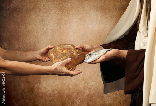 Photo: Jesus gives bread and fish Jesus gives bread and fish