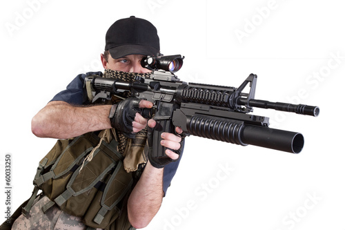 Photo: shooting mercenary isolated shooting mercenary isolated
