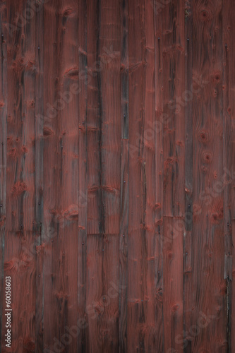 Photo: Weathered red painted wooden panel Weathered red painted wooden panel