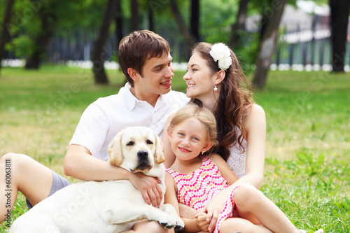 Photo: Happy family having fun outdoors Happy family having fun outdoors