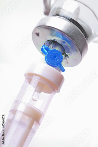 Photo: drop in IV Dripe. close-up photo drop in IV Dripe. close-up photo