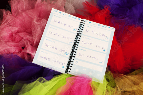 Photo: Inspirational phrases in a notepad Inspirational phrases in a notepad