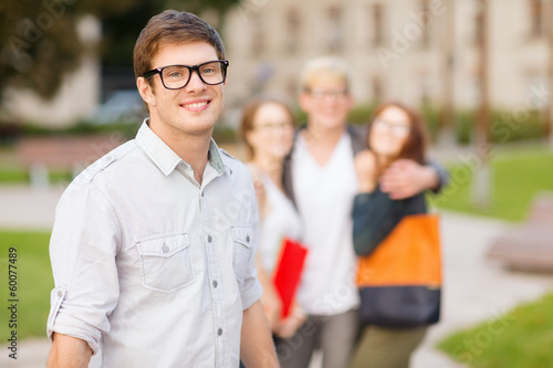 Photo: teenage boy with classmates on the back teenage boy with classmates on the back