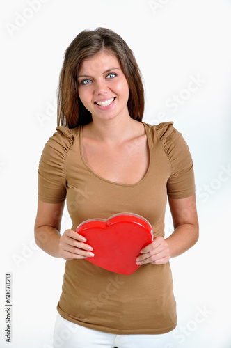Photo: cute girl smiling with present cute girl smiling with present