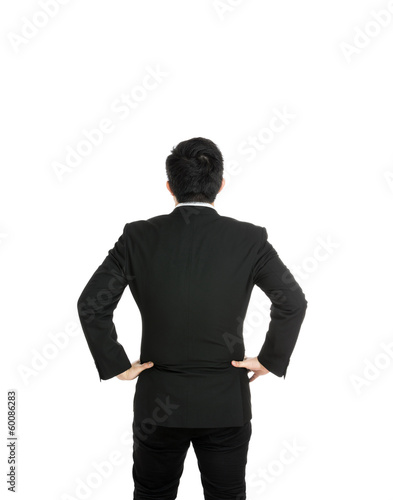 Photo: Back view with businessman hand on hip Back view with businessman hand on hip