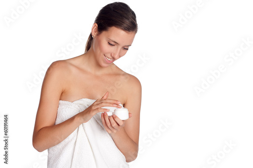 Photo: Frau mit Cremetopf in der Hand Frau mit Cremetopf in der Hand