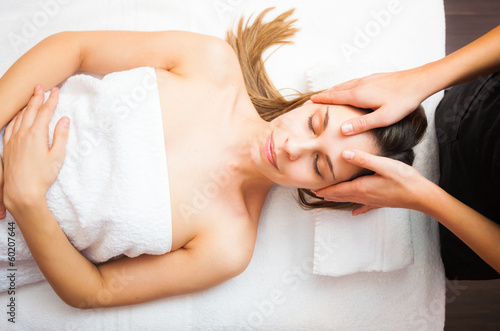 Photo: Woman having an head massage Woman having an head massage