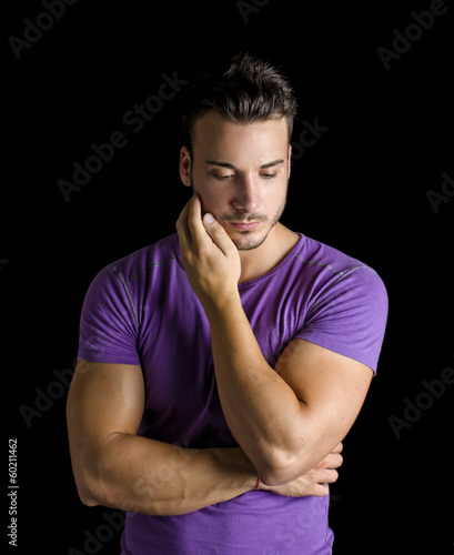 Photo: Sad or worried handsome young man Sad or worried handsome young man