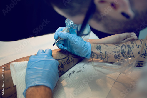 Photo: tattoo artist tattoo artist