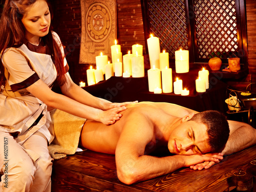 Photo: Man having Ayurvedic spa treatment. Man having Ayurvedic spa treatment.