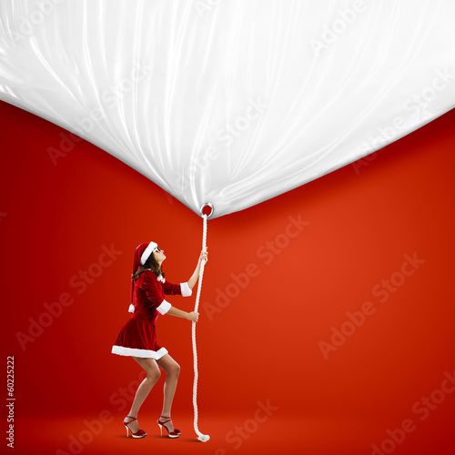 Photo: Santa girl with banner Santa girl with banner