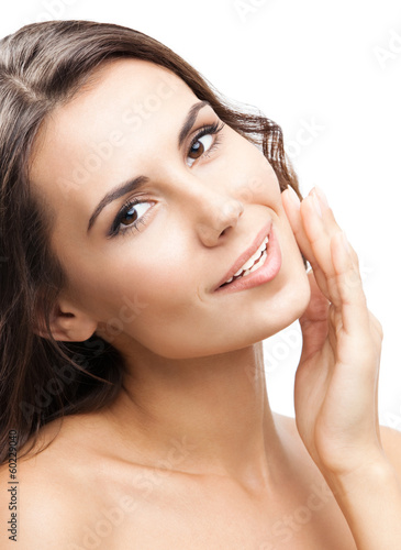 Photo: Woman touching skin or applying cream, isolated Woman touching skin or applying cream, isolated