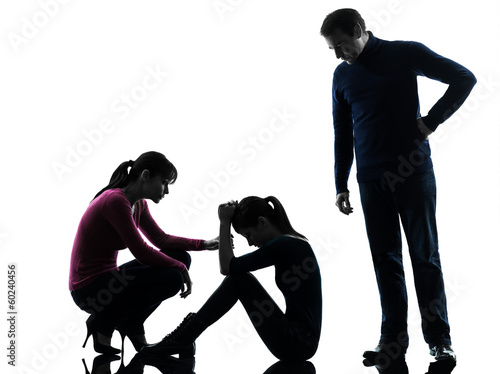 Photo: family father mother consoling daughter silhouette family father mother consoling daughter silhouette